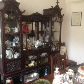 Large dresser full of antiques